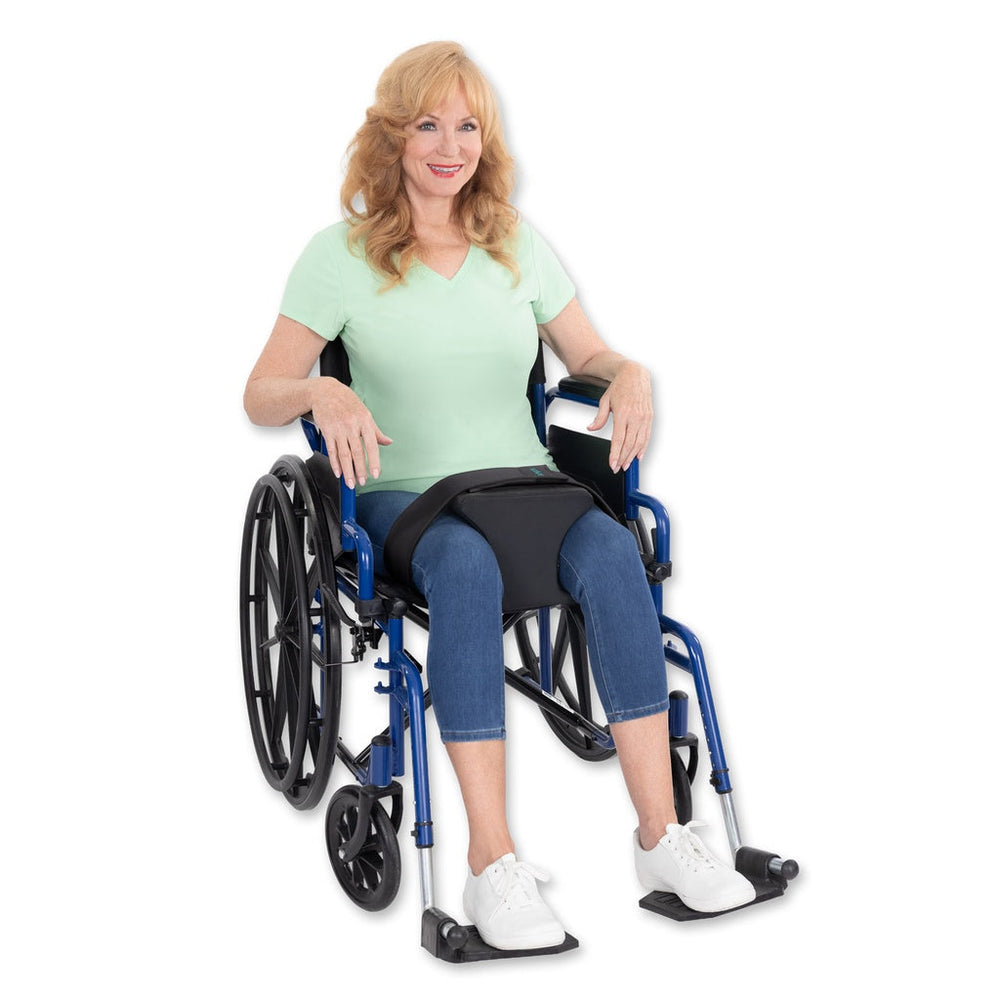 A smiling woman using a comfort support cushion in her wheelchair